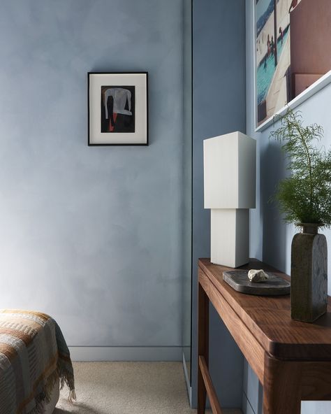 “I wanted a very ‘mondrian-esque” style apartment to suit the building design but the limewash on the walls was essential for softening that look.” - Leo Painted with Bauwerk colour - Forget Me Not, this is a mid tone blue limewash colour. Named for the small spring flowers. Designer @leo_kinderdesign Photographer @boz_gagovski Styling @dsweetstudio Wanut Console - @bench.studio #limewash #bauwerk #bauwerkforgetmenot #designwithnature #organictextures #minimalistdesign #limewash #textured... Blue Limewash Bedroom, Limewash Ceiling, Blue Limewash Walls, Painted Bedroom Ceiling, Blue Limewash, Limewash Bedroom, Limewash Interior, Salon Blue, Bachelor Apartment