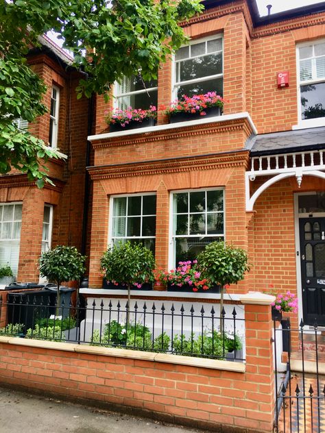 Front Porch Terrace House, Brick Wall With Iron Railings, Bay Tree Front Garden, Grey Brick Garden Wall, Brick Wall Front Of House, Window Boxes On Brick House, Terrace House Front Garden, Terraced House Front Garden, Edwardian House Exterior