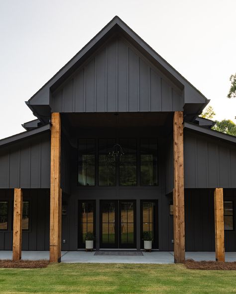 Bold and beautiful! This home's exterior makes a striking statement with Urban Bronze by @sherwinwilliams. 🖤    Builder: @restorebuildanddesign  Design: @hawkinsandgraydesign Black Industrial House Exterior, Metal Siding House Exterior, Adu Inspiration, Metal Siding House, Industrial House Exterior, Urban Bronze, Industrial Exterior, Metal Siding, Black Industrial