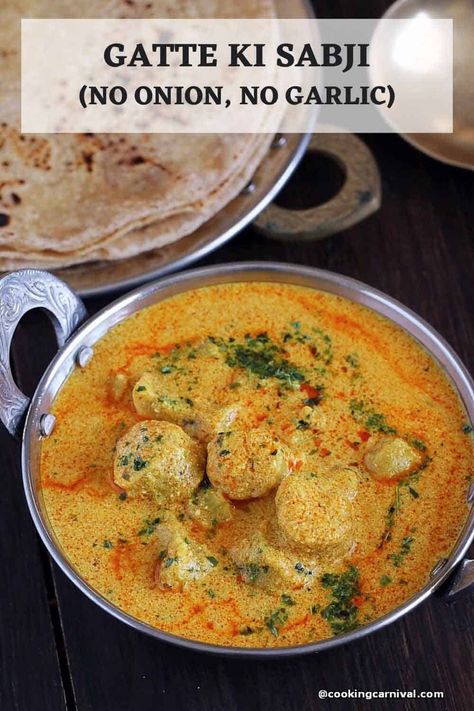 A traditional Rajasthani recipe made with gram flour sausages, cooked in spicy yogurt-based gravy – this Gatte Ki Sabji is so so delicious. You will be amazed that a curry that tastes so good is made with a handful of ingredients found in your pantry. Plus this recipe is made without onion and garlic and is a great option on the menu if you run out of fresh vegetables. #novegetable #noonionnogarlic #rajasthani #gattekisabji Flour Dumplings, Cooking Curry, Rajasthani Food, How To Make Dough, Gram Flour, Indian Food Recipes Vegetarian, Recipes Vegetarian, Coriander Seeds, Indian Spices