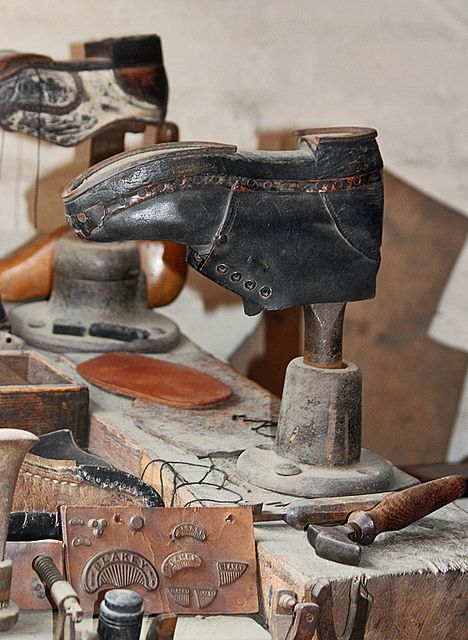 cobblers shop Shoe Cobbler, Shoe Repair Shop, Victorian Life, Old Boots, All Are Welcome, Leather Craft Tools, Leather Workshop, Shoe Shine, Shoe Last