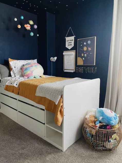 Easy DIY space themed bedroom ideas Space Theme Teenage Bedroom, Space Themed Bedroom Paint Colors, Space Themed Bedroom Boys Walmart, Best Dark Paint Colors, Blue Boys Room, Space Themed Bedroom Boys Artwork, Outer Space Kids Bedding, Dark Gray Paint Colors, Yellow Bedspread