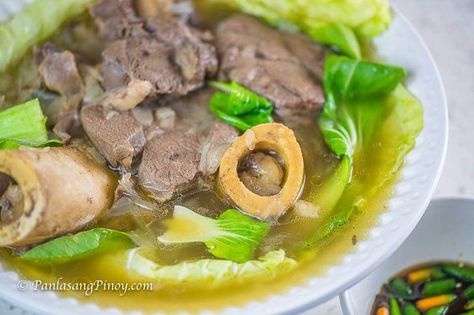 Batangas Bulalo is probably the most basic and simplest version of bulalo. If you are not familiar with this dish, it is a type of Filipino beef shank soup Lutong Bahay Filipino Food, Pinoy Lunch, Bulalo Soup, Filipino Soups, Bulalo Recipe, Nilaga Recipe, Beef Shank Soup, Pinoy Recipe, Philippine Cuisine