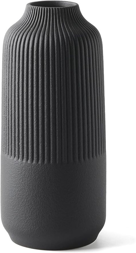 Matte Black Vase Textured Vase Ceramic Minimalist Fluted Vase Decor Modern Ribbed Flower Vases for Home Living Room, Office, Centerpiece and Wedding

Material	Ceramic
Color	Black
Brand	TCIUXYQ
Product Dimensions	11"L x 6"W x 6"H
Shape	Fluted,Modern Matte Black Vase, Ceramic Minimalist, Farmhouse Vase, Textured Vase, Fluted Vase, Modern Boho Decor, Handmade Ceramics Vase, White Ceramic Vases, Black Vase