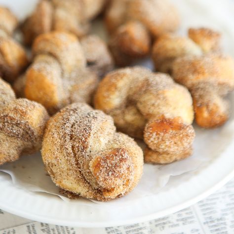 Every fall when the weather cools down, chai somehow makes its way into my baking regimen. Chai has a way of taking ordinary cinnamon based recipes to the next level of wonderful, and this recipe for Spicy Chai Knots makes those warm fall flavors come to life. These twisted little bundles taste so much like churros that I was tempted to name this recipe differently. I settled on Spicy Chai Knots as these golden puff pastry bundles are baked and not fried like churros are. Use cinnamon sugar t... Puff Pastry Bundles, Homemade Chai, High Tea Party, Flavored Sugar, Fall Flavors, Chai Spice, Breakfast Bake, Autumn Flavors, Pastry Recipes