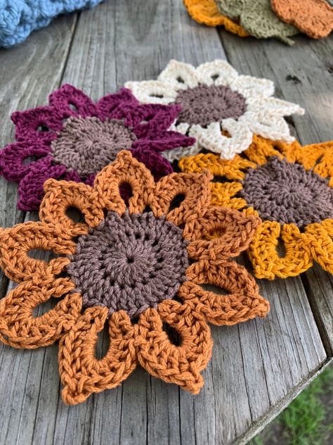 This is a handmade coaster set that doubles as adorable fall decor as well as protection for your furniture. Set comes with 4 coasters made out of 100% cotton yarn. Can make any combination of colors, send me a message for custom orders! Crochet Gifts For Grandma, Crochet Fall Coasters, Fall Coasters, Crochet Coaster Set, Sunflower Coasters, Crochet Cup Coaster, Crocheted Coasters, Crochet Autumn, Crochet Coffee Cozy