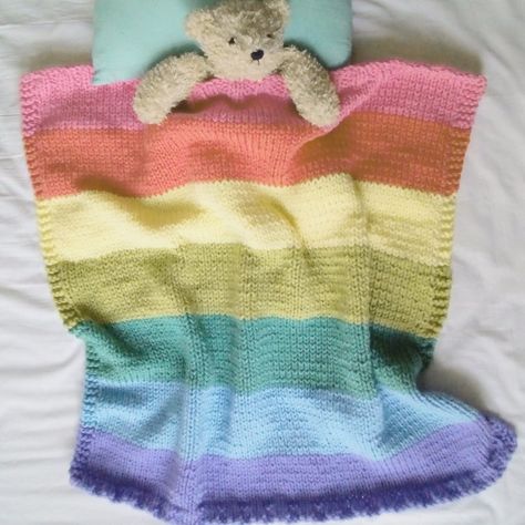 Get the knit pattern, designed by Lynn Garrett of Biscuit Scout #knitting Chunky Cable Knit Throw, Rainbow Stuff, Knit Afghan Patterns, Rainbow Baby Blanket, Knit Rainbow, Blanket Knitting Pattern, Cable Knit Throw, Baby Blanket Knitting, Easy Knit