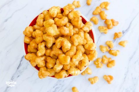 Copycat Beaver Nuggets | Imperial Sugar Beaver Nuggets Recipe, Cheesy Chex Mix, Bucees Texas, Beaver Nuggets, Caramel Puff Corn, Puff Corn, Party Mix Snacks, Homemade Soft Pretzels, Nuggets Recipe