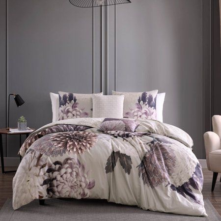 Shades of plum and amethyst come to life on the Bebejan Bloom 100% Cotton 5 Piece reversible King Comforter Sets bold, enlarged floral print, while on the reverse side, a more subdued neutral version of the print tones down the effect. The versatility of this soft 100% cotton sateen reversible comforter makes it at home in any style of room. The 5 Piece set includes a reversible comforter, 2 reversible shams with 2 quilted and printed decorative pillows. Color: Purple. Luxury Comforter Sets, Cotton Comforter Set, Reversible Comforter, Sustainable Fabric, King Comforter Sets, Cotton Comforters, Queen Comforter Sets, Print Comforter, Floral Prints Pattern