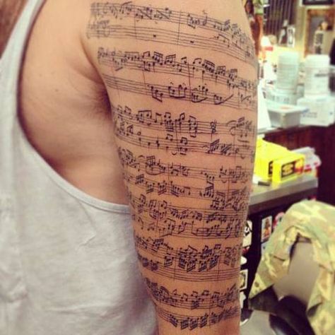 Music staff and notes tattooed on the upper arm. Staff Tattoo, Music Staff Tattoo, Staff Music, Music Tattoo Sleeves, Arm Sleeve Tattoo, Minimalist Tattoo Ideas, Tattoo Music, Music Notation, Music Tattoo Designs