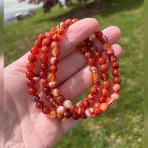 This listing is for one Carnelian bracelet like shown. Made with natural, vibrant 6mm Carnelian beads, these bracelets are about 7in long meaning they will fit wrists under 7in.  Carnelian is a stone of emotional strength and physical vitality. It brings us peace and acceptance of the cycle of life and helps us remember to only worry over what we can control. Supporting the Sacral and Root Chakras, Carnelian brings a sense of safety and comfort. It is also a stone of success and triumph. With it Orange Crystal Bracelet, Fire Energy, Carnelian Bracelet, Emotional Strength, Xmas List, Orange Stone, Cycle Of Life, Carnelian Beads, Sacral Chakra