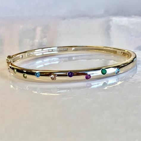 bracelet has genuine stones (blue zircon, amethyst, diamond, topaz, peridot and garnet 14k Gold Bangle Bracelet, Gemstone Bangle Bracelets, Gemstone Bangle, Gold Bangle Bracelet, Gold Bangle, Epiphany, Blue Zircon, Custom Bracelets, Italian Charm Bracelet