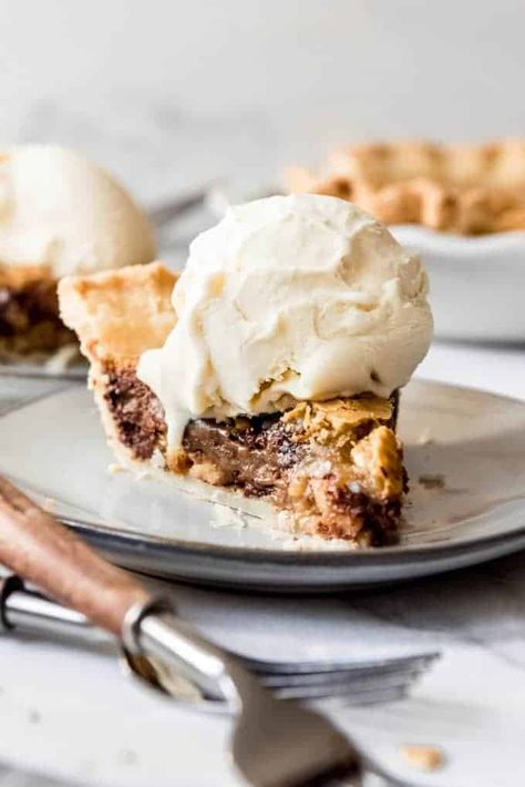 With a flaky, buttery crust and rich filling, this Kentucky Chocolate Walnut Pie is a state favorite, especially on Derby Day! It's amazing with a scoop of vanilla ice cream on the side! #Kentucky #derby #chocolate #walnuts #pie #best #easy #homemade #fromscratch #recipe Chocolate Walnut Pie, Chocolate Chip Cookie Pie, Desserts With Chocolate Chips, Tollhouse Chocolate Chip Cookies, Chocolate Chip Pie, Walnut Pie, Toll House Chocolate Chip, Giant Chocolate Chip Cookie, Easy Pie Recipes