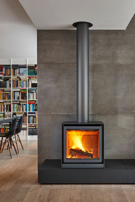 With black podium Wood Burning Stoves Living Room, Modern Wood Burning Stoves, Modern Stoves, Woodburning Stove, Wood Heater, Freestanding Fireplace, Wood Burning Fires, Log Burner, Stove Fireplace