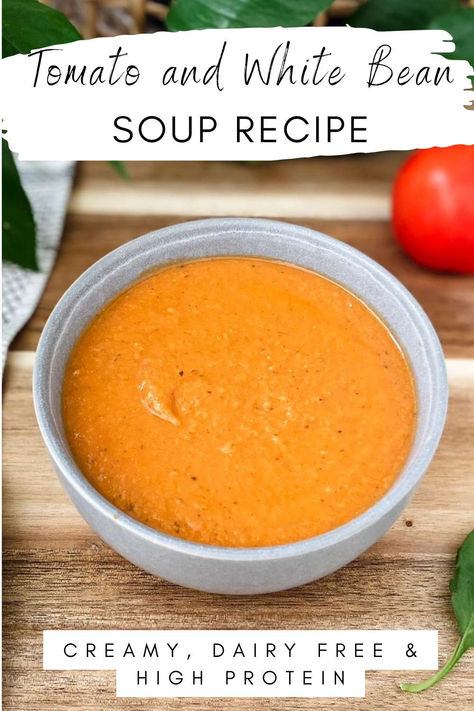 white bean and tomato soup in a grey bow on a wood chopping board with a fresh tomato in the background. High Protein Tomato Soup, Tomato Bean Soup, Dairy Free High Protein, Dairy Free Tomato Soup, White Bean Soup Recipes, Bean Soup Recipe, Soup Beans, Healthy Soups, Canned Tomatoes