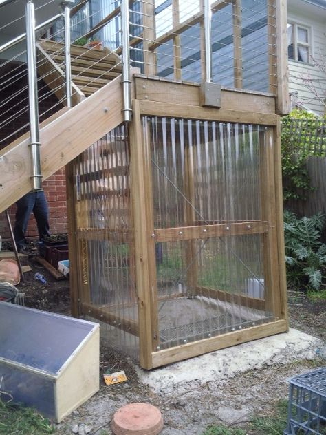 Greenhouse under the stairs Deck Greenhouse Diy, Under Deck Stairs Ideas, Greenhouse Under Deck, Greenhouse On Deck, Deck Greenhouse, Porch Greenhouse, Apartment Porch, Cold Frame Diy, Under Deck