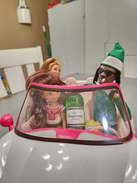 Snoop Dogg in a convertible with girls and Gin and Juice.  (Elf on a Shelf but for adults) Snoop On A Stoop Elf Ideas, Snoop Dog Elf On The Shelf, Snoop Elf On Shelf, Snoop On The Stoop Ideas Funny Hilarious, Snoop Elf Ideas, Funny Snoop On A Stoop Ideas, Snoop On The Stoop, Snoop Dogg Elf On The Shelf Ideas, Snoop On A Stoop Ideas