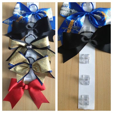 Cheer bow holder! Clear clips glued to a strip of ribbon and you clip the scrungy to hang the bow :) Cheer Bow Storage Ideas, Cheer Bow Holder Diy, Cheer Crafts, Cheer Bow Holder, Cheer Bows Diy, Cheer Routines, Cheer Leading, Bow Storage, Cheer Spirit