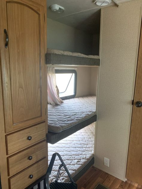 15 Renovation Ideas for an RV with Bunk Beds | RV Inspiration Rv Triple Bunk Beds Ideas, Rv Bunk Beds Remodel, Fold Up Bunk Beds Camper, Camper Trailer Bunk Bed Ideas, Horse Trailer Bunk Bed Ideas, Camper Bunk Curtains, Camper Bunk Remodel, Rv Bunk Bed Storage Ideas, Rv Top Bunk Storage Ideas