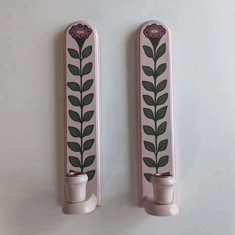 Hand painted candle sconces. I was worried these would be too narrow to fit much but I think the single stem turned out so cute. These won't be for sale but I love painting these and hope to keep finding more! #handpainted #handpaintedfurniture #candlesticks #walldecor #bohodecor #bohohome #bohohomedecor #folkart #fusionmineralpaint #pasteldecor #pastelhomedecor #pastelhome #interiordesign #colorfulhome #colorfulinterior #floralart Wooden Candle Sconces, Painted Candlesticks, Pastel Home Decor, Hand Painted Candles, Wall Scones, Pastel House, Pastel Decor, Painted Candles, Candle Wall Sconces