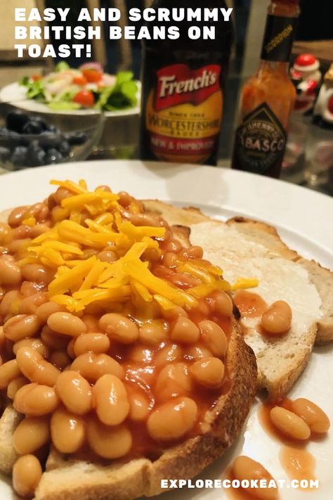 A white plate containing beans on buttered pieces of toast and topped with shredded cheddar cheese.  There are bottles of worcestershire sauce and Tabasco behind the plate as well as a plate of green salad and Mr. and Mrs. Claus salt and pepper shakers. English Beans And Toast, Heinz Beans, Spottie Dottie, Beans On Toast, British Dishes, Bariatric Friendly Recipes, Dane Dehaan, English Food, British Food