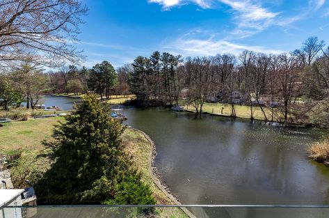 Stunning waterfront home on Lake Barcroft in Falls Church. Quiet staycation oasis minutes from shopping, restaurants and commuter routes with easy access to Metro, the Pentagon and downtown DC. Listed by The Casey Samson Team. Visit our site for all the photo's and details. Falls Church Virginia, Multi Level Deck, Waterfall Landscape, Fairfax County, Pool Waterfall, The Pentagon, Private Dock, Falls Church, Picture Windows