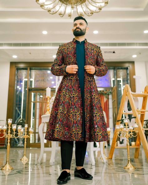 Presenting you latest outfit ideas for groom. From royal sherwani for grooms to party wear black suits, we have got all. Check out our blog for more. #shaadisaga #indianwedding #outfitforgroom #sherwaniforgroom #blacksuitforwedding #blacksuitforgroomsmen #partywearblacksuitformen #classicblacksuitforwedding #haldioutfitforgroom #haldioutfitforgroomyellow #haldioutfitforgroomdesigner #mehendioutfitforgroom #mehendioutfitforgroomgreen #engagementoutfitforgroom #engagementoutfitformen #sherwani Groom Trends, Engagement Dress For Groom, Dapper Outfit, Groom Dress Men, Indian Groom Wear, Embellished Wedding Dress, Wedding Dresses Men Indian, Sherwani Groom, Embroidered Wedding Dress