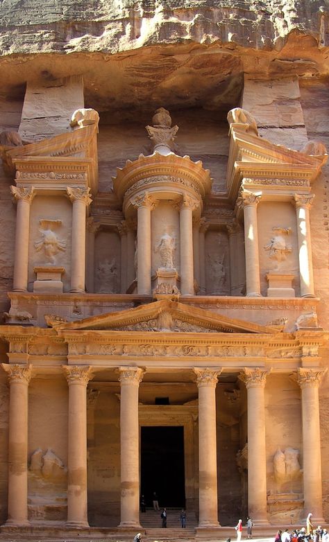 Al-Khazneh ("The Treasury") is one of the most elaborate temples in Petra, a city of the Nabatean Kingdom inhabited by the Arabs in ancient times. As with most of the other buildings in this ancient town, including the Monastery (Arabic: Ad Deir), this structure was carved out of a sandstone rock face.The structure is believed to have been the mausoleum of the Nabatean King Aretas IV in the 1st century AD. Jordan. Egyptian Buildings Architecture, Sandstone Building, Ancient Buildings Architecture, Persian Palace, Ancient Atlantis, Sandstone Rock, Minecraft Idea, Gcse Textiles, Ancient Structures