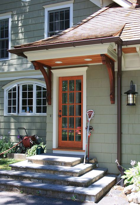 The homeowners of a 1930s Cape-style home that had been remodeled and expanded several times before they purchased it wanted an exterior facelift that would upgrade and unify the home's aesthetics while adding much needed functionality. The clients went to Titus Built, LLC with a desire for a more appealing interpretation of their traditional Cape exterior, with Craftsman elements and a sophisticated level of design. The home needed significant structural work to improve water manageme… Cape Cod House Exterior, Cape Style Homes, Shop Exterior, Craftsman Exterior, Porch Steps, Craftsman Style Home, Cape Cod House, Craftsman Style Homes, Exterior Ideas