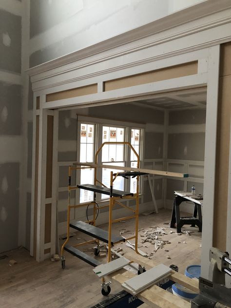 Large Doorway Trim Ideas, Trim Between Rooms, Framing Open Doorways, Paneled Cased Opening, Room Opening Trim Ideas, Large Cased Openings Between Rooms, Doorway Molding Ideas, Cased Opening Trim, Cased Openings Between Rooms