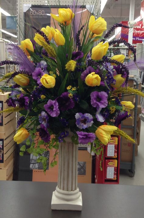 Floral arrangement designed by Danielle Abaire - AC Moore Store#121 -Dedham Ma Crescent Arrangement Floral Design, Purple And Gold Floral Arrangements, Crescent Flower Arrangement Design, Purple Yellow Flower Arrangements, Floral Arrangements For Mother’s Day, Artificial Plant Arrangements, Church Altar, Artificial Plant Wall, Artificial Plants Indoor