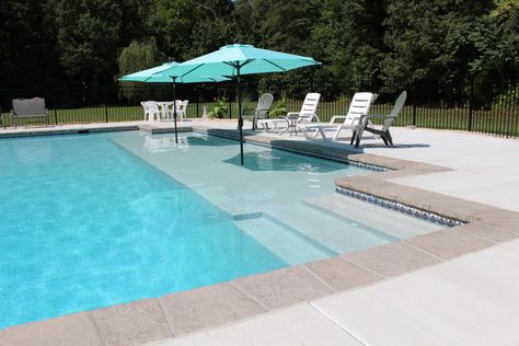 Swimming Pool with Sun Shelf | The Pool Company Construction Pool With Sun Shelf, Rectangle Pools, Sun Shelf, Luxury Pools Indoor, Pools Design, Inground Pool Designs, Rectangle Pool, Beach Entry Pool, Living Pool