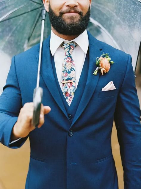 Groom in Navy Suit and Floral Tie With Umbrella Bright Wedding Invitations, Ashton Gardens, Umbrella Photo, Daytime Wedding, Groom Wedding Attire, Wedding Roles, Groom Ties, August Wedding, Bright Wedding