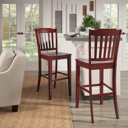 Create charming style to your dining or kitchen space with these lovely Weston Home Farmhouse Slat Back bar stools. Crafted from solid rubberwood that is Eco-friendly and durable, these traditional chairs will stand the test of time. Not only are these chairs from the Weston Home Farmhouse collection available in a variety of finishes, but they are also designed with multiple chair back options to pair well with any aesthetic. The classic silhouettes are easy to assemble and will easily fit in w Bar Height Chairs, Back Bar, Wood Bar Stools, Traditional Chairs, Wood Bar, Bar Height, Dining Room Bar, Furniture Outlet Stores, Transitional Design