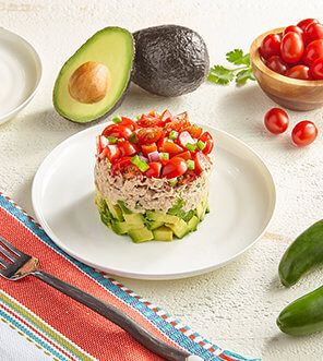 Avocado & Tuna Tomato Salad Stack - Avocados From Mexico Seafood Stack, Avocado Snacks, Tuna Tomato, Avocado Recipes Healthy, Avocado Tuna, Fish Entrees, Avocados From Mexico, Avocado Tuna Salad, Tuna Avocado