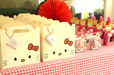 Hello Kitty Party for Bianca | CatchMyParty.com Hello Kitty Birthday Party Favors, Hello Kitty Candy Bags, Sanrio Party Favors, Hello Kitty Favors, Hello Kitty Party Favors, Kitty Birthday Party Ideas, Hello Kitty Birthday Party Ideas, Sanrio Party, Birthday Hello Kitty