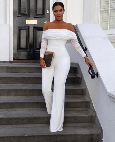 This White Long Sleeve Jumpsuit is the perfect fashion statement for any special occasion. Whether you're attending a prom, wedding, dinner, or evening event, this jumpsuit is sure to turn heads. It features an off-shoulder design that is flattering and elegant and is finished with a stylish pleated bottom. The fabric is lightweight and breathable, making it comfortable to wear all night. This African inspired jumpsuit is perfect for a modern, on-trend look. The white color is timeless and versa White Long Sleeve Jumpsuit, Prom Jumpsuit, White Outfits For Women, White Party Outfit, 90s Fashion Outfits Hip Hop Party, Gaun Fashion, Chique Outfits, Wedding Jumpsuit, All White Outfit