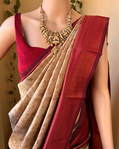 Www.thejacouture.in> silk sarees> Ivory art silk saree. Ivory art silk saree with contrast reddish maroon border. Comes with copper gold zari design all over saree and pallu with contrast blouse . Blouse : 80cm Wash care: Normal wash. Jewellery: @elegant_fashion6095 #ivorysaree #artsilk #saree #sareelove #indiantradition #silksarees #uniquecombination #instagramsarees #onlineshopping Ivory Saree With Contrast Blouse, Copper Saree, Jewellery Elegant, Maroon Saree, Half Saree Lehenga, Tamil Wedding, Saree Lehenga, Maroon Blouse, Cream Blouse