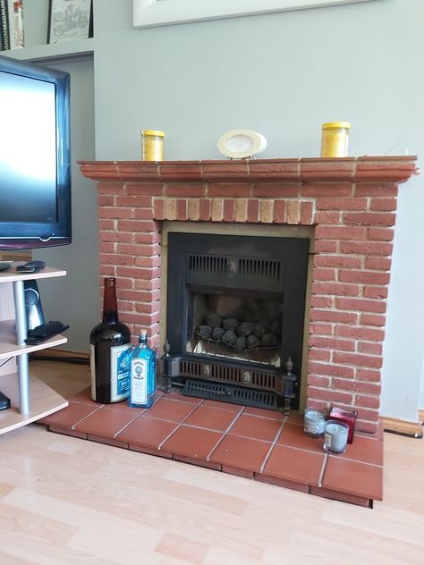 Old brick fireplace and defunct gas fire.  Terracotta tile hearth. Brick And Tile Fireplace, Old Brick Fireplace, Tile Hearth, Brick Fireplaces, Brick Fireplace Makeover, Terracotta Tile, Room Fireplace, Red Tiles, Old Bricks