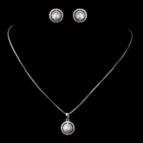 Wedding Pearl Necklace and Earring Jewelry Set, Bridal Pearl Jewelry Set Material : Cubic Zirconia. Plating : Platinum. Pendant Shape : Round. Suitable for : Female. Style : Fashion. Usage : Decoration. Usage : Decoration, Wedding and Party. Color : Silver. Length : 45cm. Elegant Jewelry , wedding jewelry , bridal jewelry Cubic zirconia versus diamond: There are a few key features of cubic zirconia which distinguish it from diamond: One face of an uncut oc Bridal Pearl Jewelry, Wedding Pearl Necklace, Simple Silver Jewelry, German Silver Jewelry, Pearl Bridal Jewelry, Pearl Necklace Wedding, Silver Jewellery Indian, Bridal Jewelry Set, Wedding Store