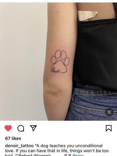 Paw Tattoo Placement, Dog Tattoo Back Of Arm, Dog Tattoo Initial, Dog Paw Outline Tattoo, Dog Ear Tattoo With Name, Dog Tattoo With Name, Dog Name Tattoos For Women, Paw Print Initial Tattoo, Paw Print Outline Tattoo