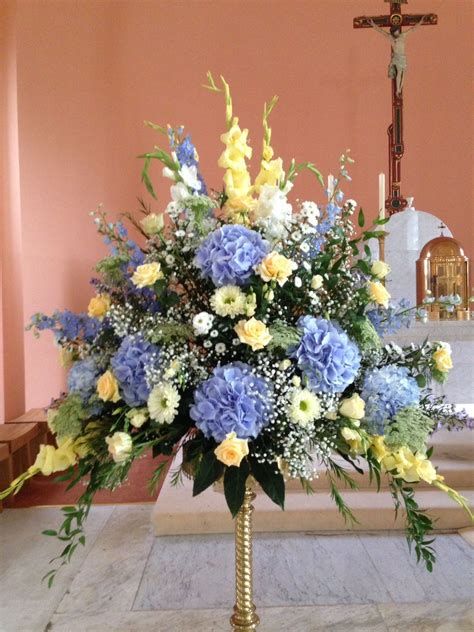 Blue Yellow White Flower Arrangement, Blue Floral Table Arrangements, Hydrangea Altar Arrangement, Blue And Yellow Flower Arrangements, Altar Flower Arrangements, Alter Decorations, Yellow Flower Arrangements, Altar Arrangements, Alter Flowers