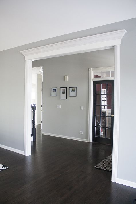 Benjamin Moore Gray Owl | you're so martha Benjamin Moore Gray Living Room, Living Room Paint Color Ideas Accent Wall, Shiplap Grey Wall, Gray Foyer Entryway Paint Colors, Gray Walls With Hardwood Floors, Grey Tint Benjamin Moore, Bm Owl Gray, Interior Paint With Dark Wood Floors, Wall Color For Living Room With Gray Furniture