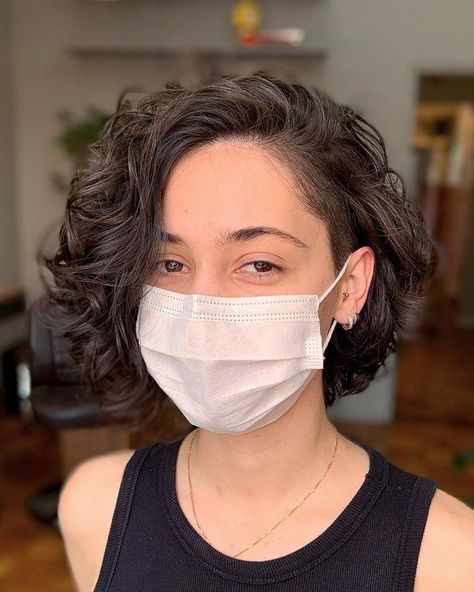 Subtle Shaved Side Hairstyles, Curly Bob With Shaved Side, Curly Bob Shaved Side, Subtle Undercut Women Bob, Short Wavy Hair Shaved Sides, Short Wavy Hair Undercut Woman, Undercut Bob Curly Hair, Subtle Side Shave, Undercut Curly Bob Haircut