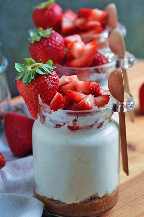 Strawberry Cheesecake in a Jar ⋆ Real Housemoms Strawberry Cheesecake In A Jar, Strawberry Cheesecake Parfait, Strawberry Cheesecake Parfaits, Cheesecake Parfait, Mason Jar Desserts, Cheesecake Parfaits, Cheesecake In A Jar, Refreshing Snacks, Dessert In A Jar