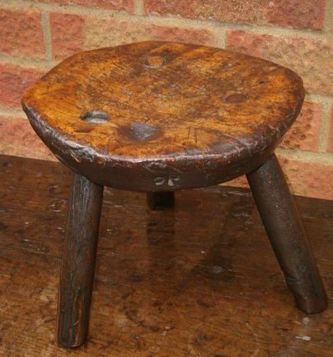 A delightful small elm milking stool.  The burr top with three ash legs all secured with a peg to the top.  The underneath with a dish stamped DP in 13 places. Primitive Bench, Old Benches, Wooden Benches, Milking Stool, Stylish Interior Design, Wooden Stool, Primitive Antiques, Bench Stool, Country Furniture