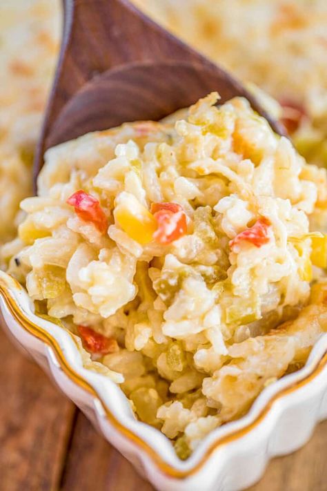 Pepper Jack Rice Bake - CRAZY good!! Cooked rice loaded with onions, red bell pepper, green chiles, corn, cream of celery soup and pepper jack cheese. Can make ahead and freezer for later. Great side dish for all your spring and summer grilling!! #casserole #sidedish #freezermeal #vegetarian Cheesy Rice Casserole, Corn Cream, Mexican Chopped Salad, Easy Chicken Fajitas, Rice Side Dish Recipes, Cheesy Rice, Rice Bake, Mexican Side Dishes, Cream Of Celery