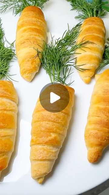 @thefeedfeed on Instagram: "Smoked Salmon Cream Cheese Stuffed Carrot Pastries by @chefgenevieve are such a fun and easy appetizer for Easter!   Get the recipe below / @thefeedfeed link in bio and keep tagging #feedfeed for a chance to be featured.  INGREDIENTS: 1 sheet or crescent dough 3oz herbed smoked salmon 7.5oz whipped garlic & herb cream cheese 1 pack of Fresh Dill  RECIPE: 1. Cut aluminum foil in 9x9 square. Fold in half then half again. Roll up into a cone shape. 2. Roll out sheet of crescent dough and cut into 8 long strips. Roll each strip around the foil cone starting at the tip and slightly overlapping. 3. Bake on a parchment lined sheet pan in a 375°F oven for 12 minutes or until golden. Remove foil cone. 4. Chop or smash down smoked salmon into small pieces. Combine with cr Carrot Puff, Garlic Herb Cream Cheese, Whipped Garlic, Puff Pastry Treats, Herb Cream Cheese, Container Company, Smoked Salmon Cream Cheese, Pastry Treats, Salmon Cream Cheese