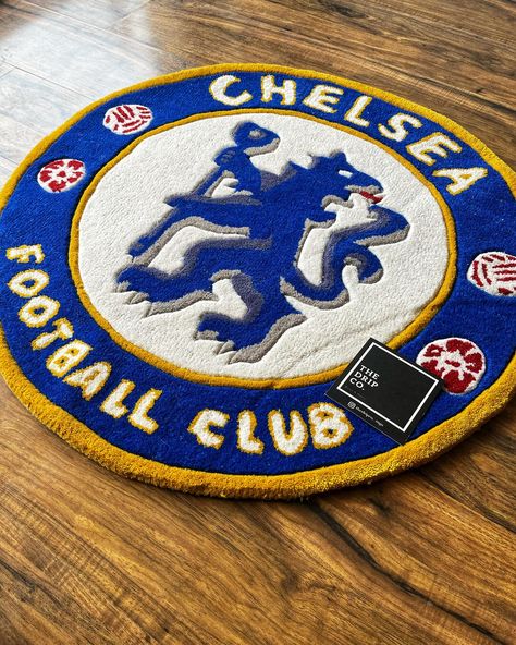 A Chelsea logo rug typically features the iconic Chelsea FC crest or logo prominently displayed on the rug’s surface. These rugs are often designed to be durable and suitable for various spaces, such as bedrooms, game rooms, or fan zones, showcasing allegiance to the football club. They come in various sizes and materials, with designs that appeal to Chelsea FC supporters. All the rugs are made upon client requests. We don’t directly design them. There are no intentions of imitating/ plagiar... Aj1 Unc, Chelsea Logo, Gengar Pokemon, Jordan 4s, Pokemon Anime, Game Rooms, Versace Home, Chelsea Fc, Custom Rugs