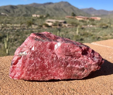 Shown above is a chunk of gem grade rhodonite. Rhodonite is a manganese rich pink gemstone which forms near silver deposits. We plan to turn this material into several cabochons for use in jewelry. #rhodonite #gem #pink #gems #gemstone #crystal #crystals Rhodonite Jewelry, Stones Aesthetic, Crystal Aesthetic, Aesthetic Pink, Pink Gemstones, South American, Crystal Gems, Geology, Precious Stones